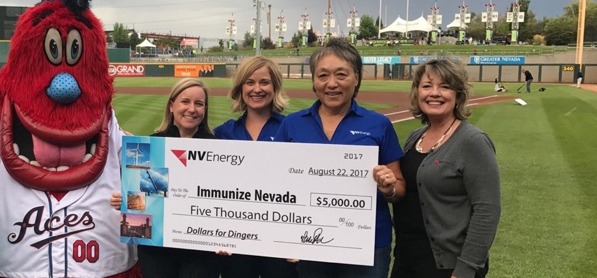 NVEnergy presents $5,000 check to Immunize Nevada at Aces baseball game 